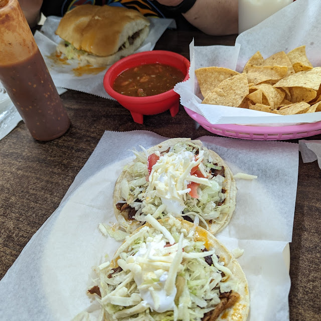 Al Pastor Tacos Chips and Salsa and a Steak Torta