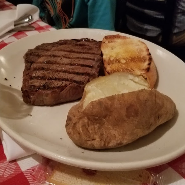10 Oz Ribeye Steak with Baked Potato