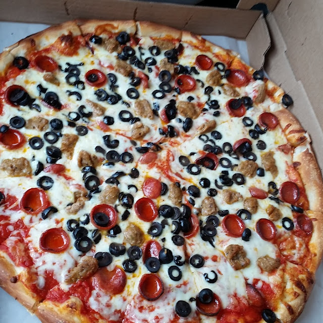 Cheese Pepperoni Sausage and Black Olives Pizza