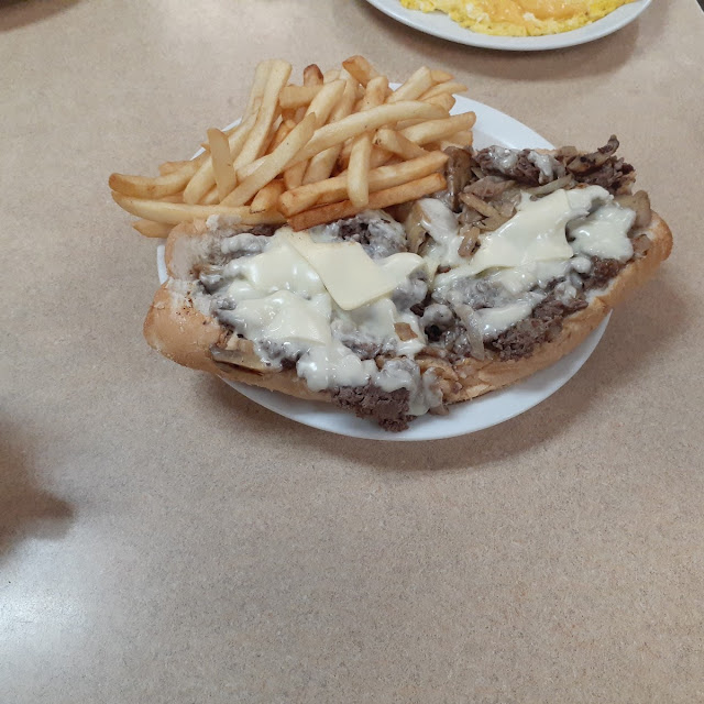 Roast Beef Philly Cheese Steak Extra Cheese with Onions and Mushrooms