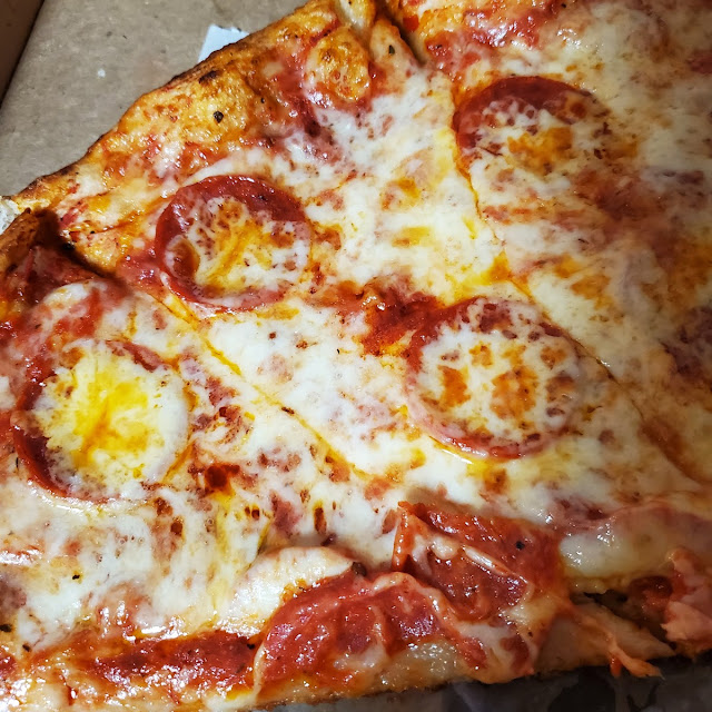 Pizza with Extra Cheese and Pepperoni