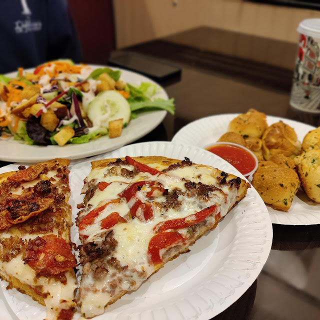 Meat Lovers Pizza Slice and Steak Ranch Slice with a Carlycci's Cascade Salad