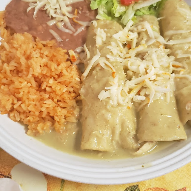 Enchiladas Verdes Green Chili Chicken Filled Corn Tortillas Rice and Refried Beans
