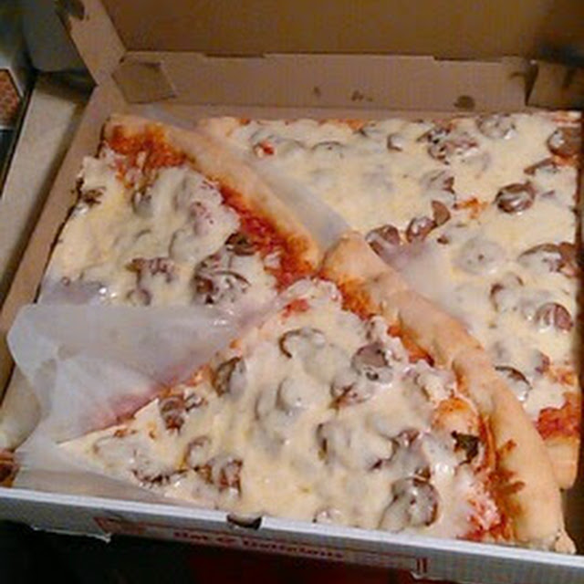 Pizza with Extra Cheese and Sausage