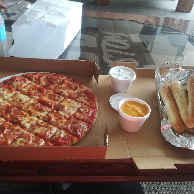 Pepperoni Pizza and Bread Sticks with Cheese