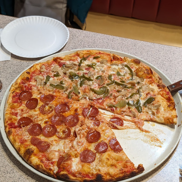 Extra Large Pizza with Pepperoni Mushrooms Sweet Peppers and Onions