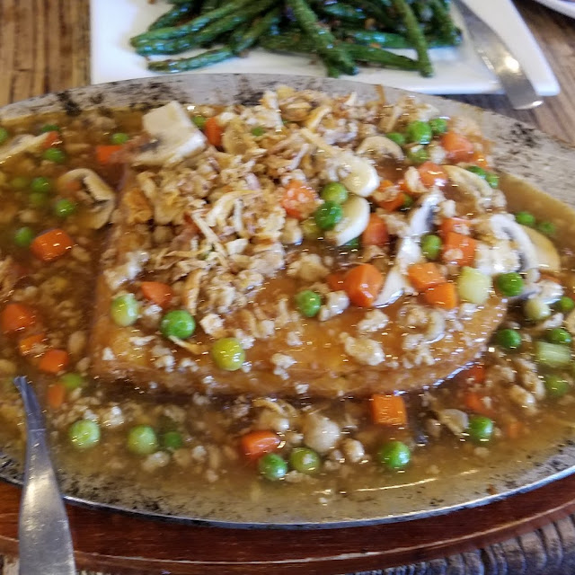 Fried Silk Tofu on Hot Cast Iron Board