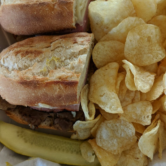 Cuban Sandwich with Chips and a Pickle