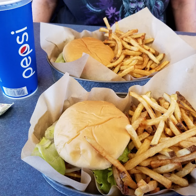Cheeseburger with Lettuce Tomatoes and Onions with Fries