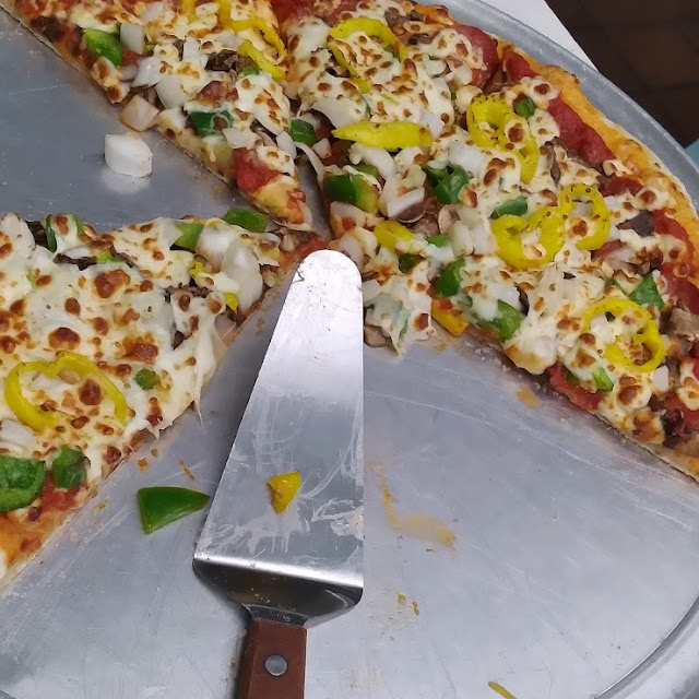 The Works Pizza Minus Sausage and Added Banana Peppers