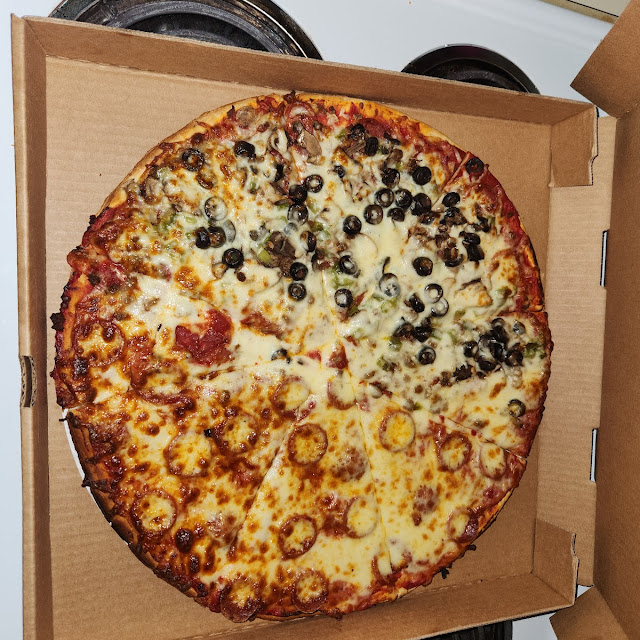 Half Pepperoni and Half Deluxe Pizza