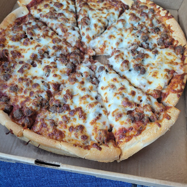 Jumbo Hamburger and Black Olive Pizza