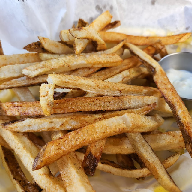 Seasoned Hand Cut French Fries w Garlic Scape Ajoli