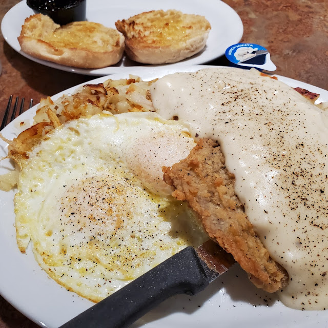 Chicken Fried Steak and Eggs Hash Browns and Toast