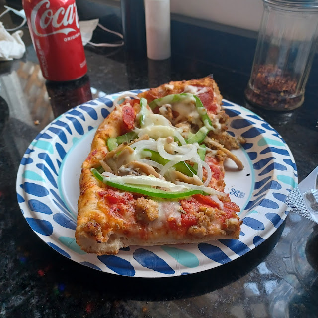 1 Piece of Supreme Pizza