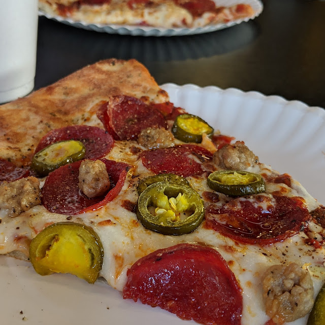 Pepperoni and Sausage Pizza Slice with Jalapenos
