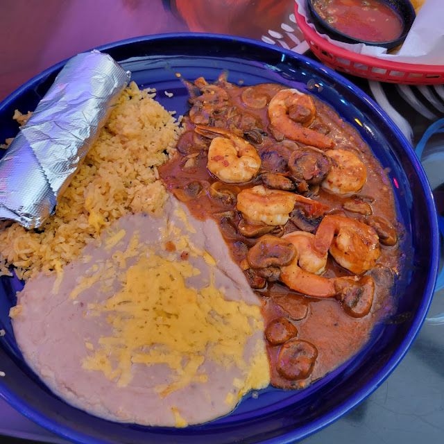 Shrimp in Mushroom Sauce Rice and Refried Beans