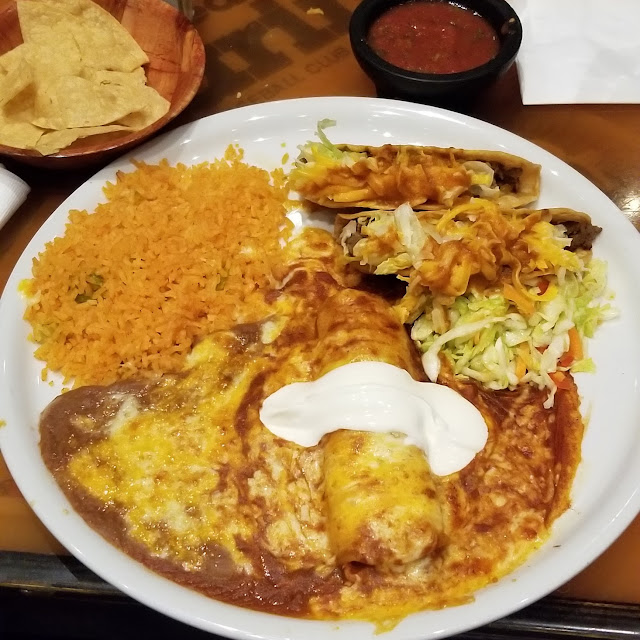 Acos and Enchilada with Red Sauce Plate Includes Rice & Beans