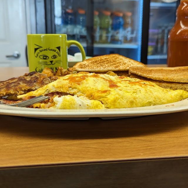 Hash Omelette Cheddar Cheese Home Fries with a Side of Sausage