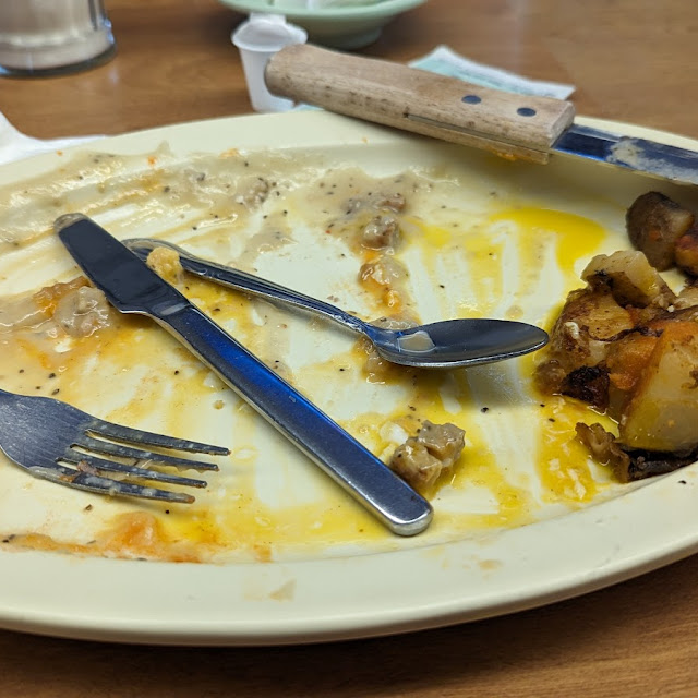Chicken Fried Steak with Three Eggs and Home Fries Right Toast