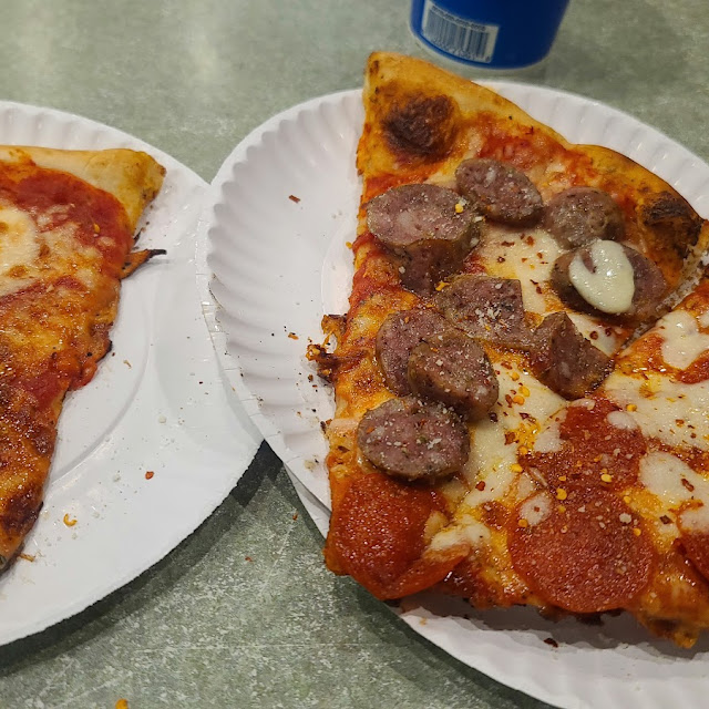 Sausage and Pepperoni Slice and a Plain Cheese Pizza