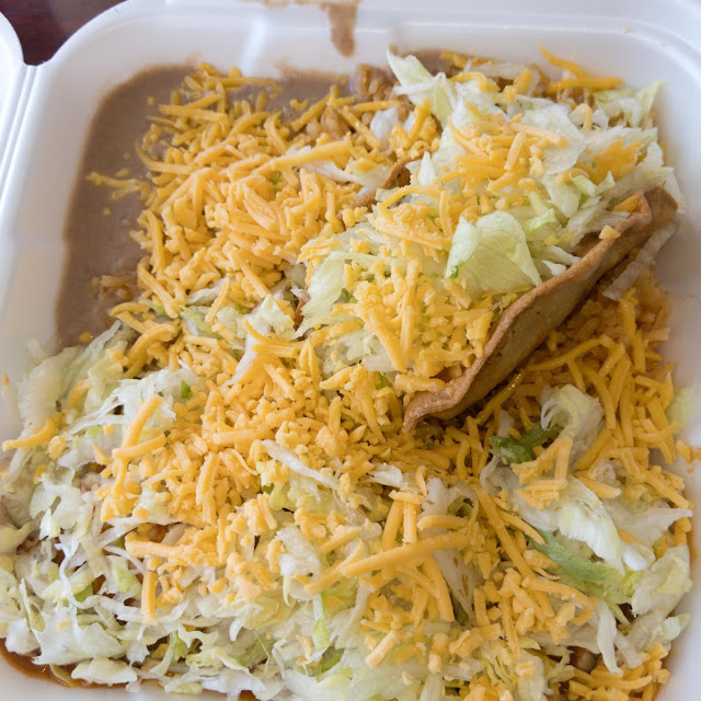 Ground Beef Taco and Chicken Enchilada with Beans and Rice and Beans