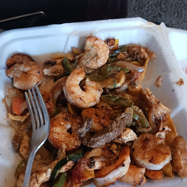 Steak Shrimp Chicken Fajita Nachos