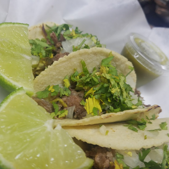 Steak Tacos with Corn Tortilla Along with Onions and Cenlontro