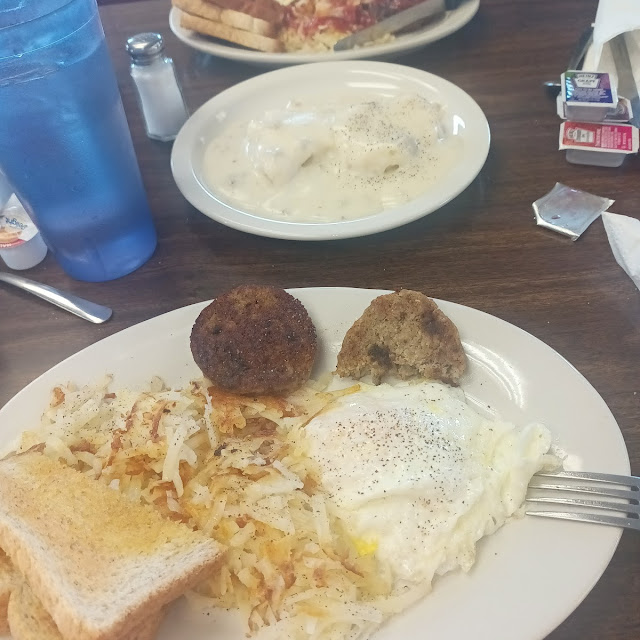 Eggs over Medium 2 Sausage Patties Hash Browns Wheat Toast and Coffee