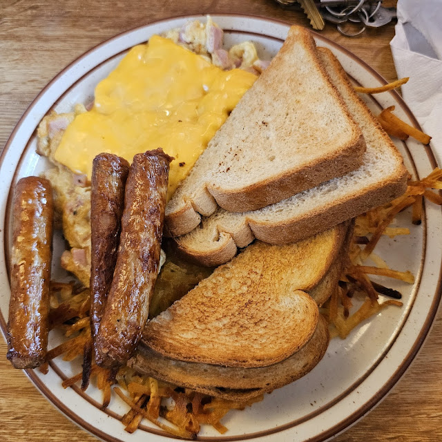 Scrambled Eggs with Cheese Hashbrowns and Sausage