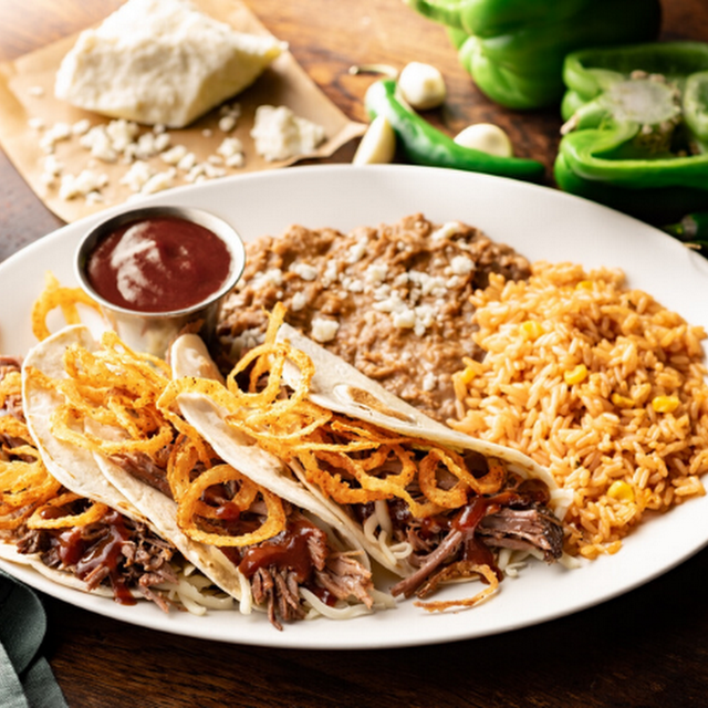 Brisket Tacos Included Shredded Brisket Jack Cheese Fried Onion Strings and Jalapeno-BBQ Sauce
