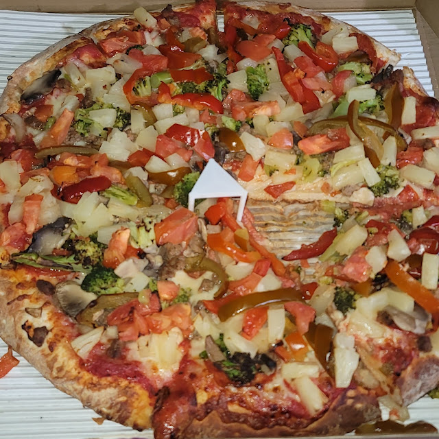 Large Cheese Pizza with Mushrooms Broccoli Sausage Pepperoni & Pineapples