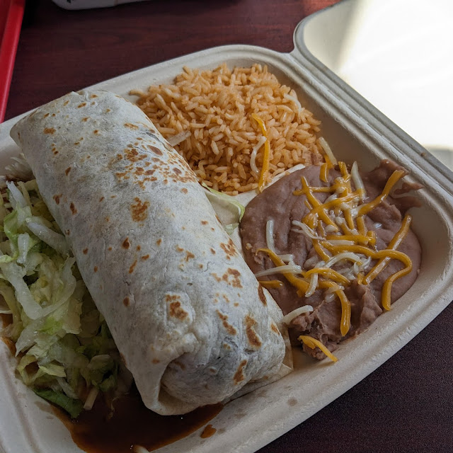 Three Rolles Tacos Rice Beans