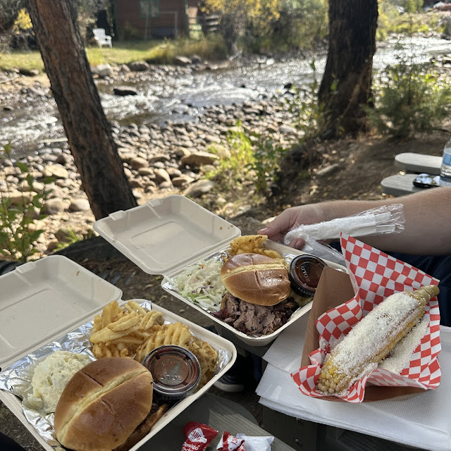 Pork Sandwich Brisket Sandwich with Fries Potato Salad and Cole Slaw