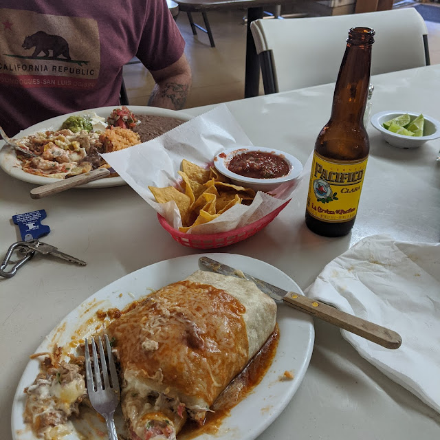Huevos Rancheros Carnitas Burrito and Pacifico