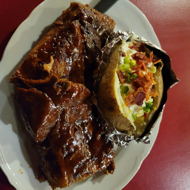 Full Rack of Ribs with a Loaded Baked Potato