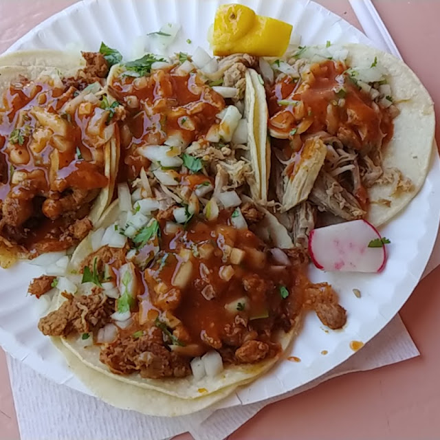 Two Al Pastor Tacos and Two Carnitas Tacos
