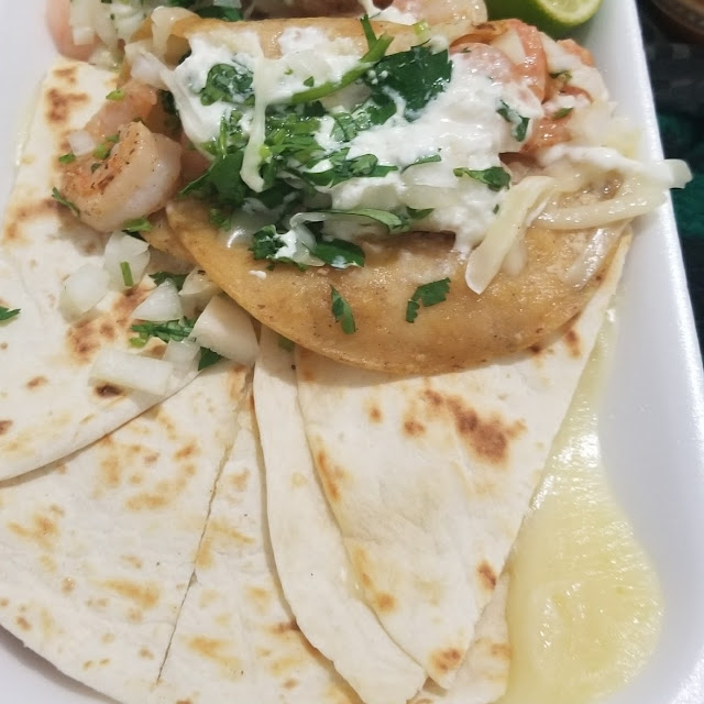 Shrimp Tacos with Sour Cream and Cheese