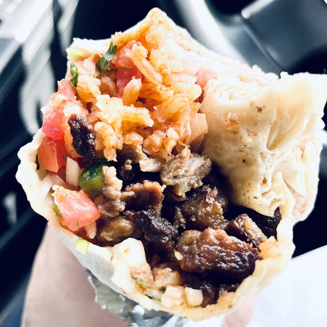 Regular Burrito with Meat Beans Rice and Mexican Salsa