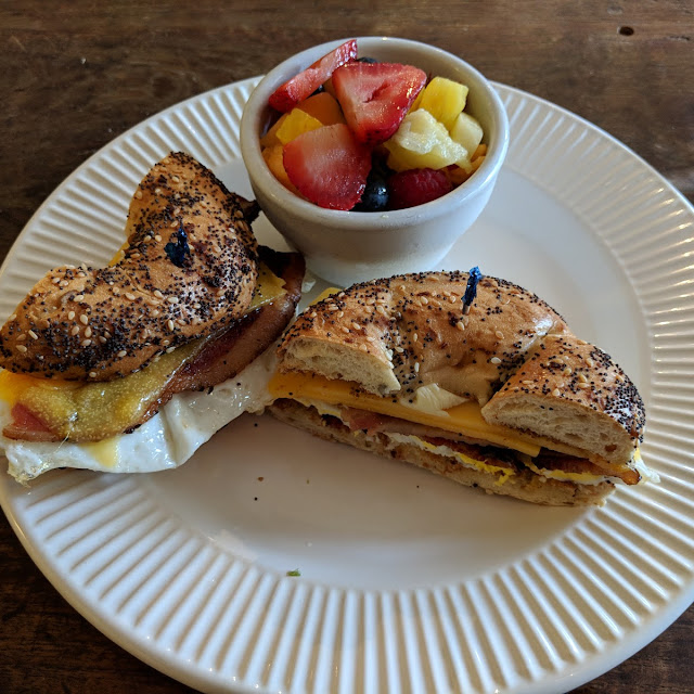 Toasted Bagel with Cream Cheese Tomato and Fresh Basil