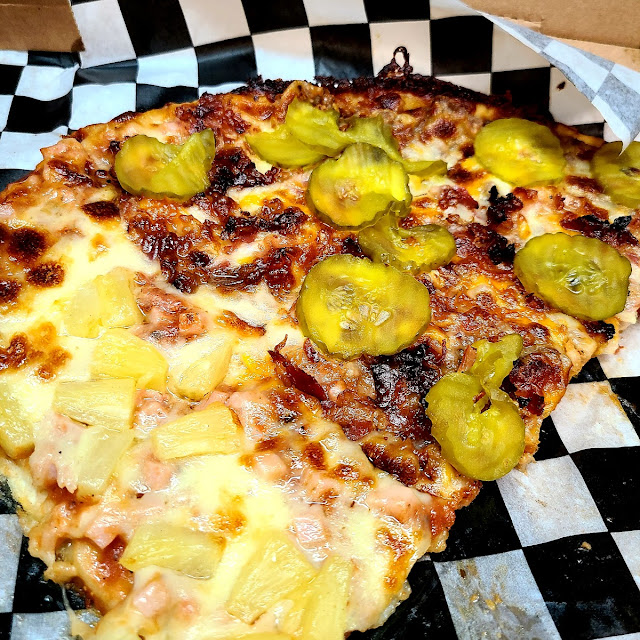 Half Bacon Cheeseburger Pizza Half Hawaiian Pizza