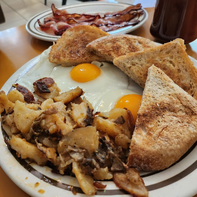 Over Easy Eggs with Home Fries and Sourdough Toast