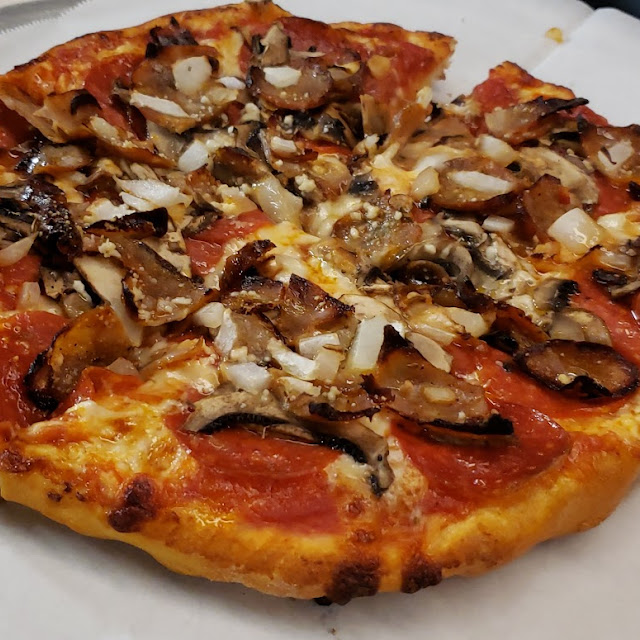 Pepperoni Sausage Mushroom and Onion Pizza