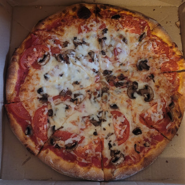 Pizza with Extra Cheese Mushrooms and Tomatoes