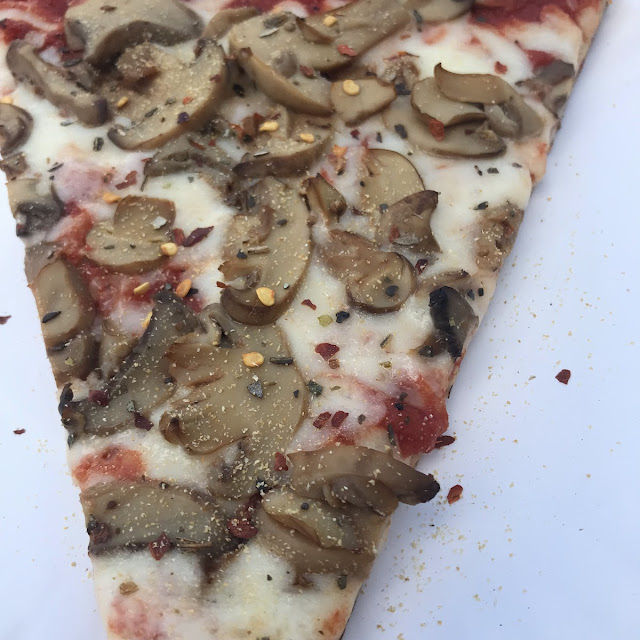 Mushrooms and Olives Pizza Slice