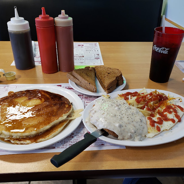 Pancakes Chicken Fried Steak and Eggs Hashbrowns w Homemade Hot Sauce