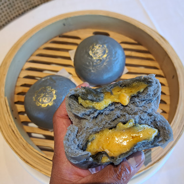 black truffle pork soup dumplings 黑松露小笼包